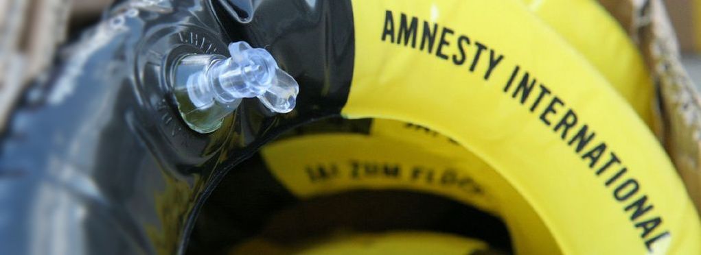 Picture: A lifesaver floatation device adorned with the Amnesty International logo